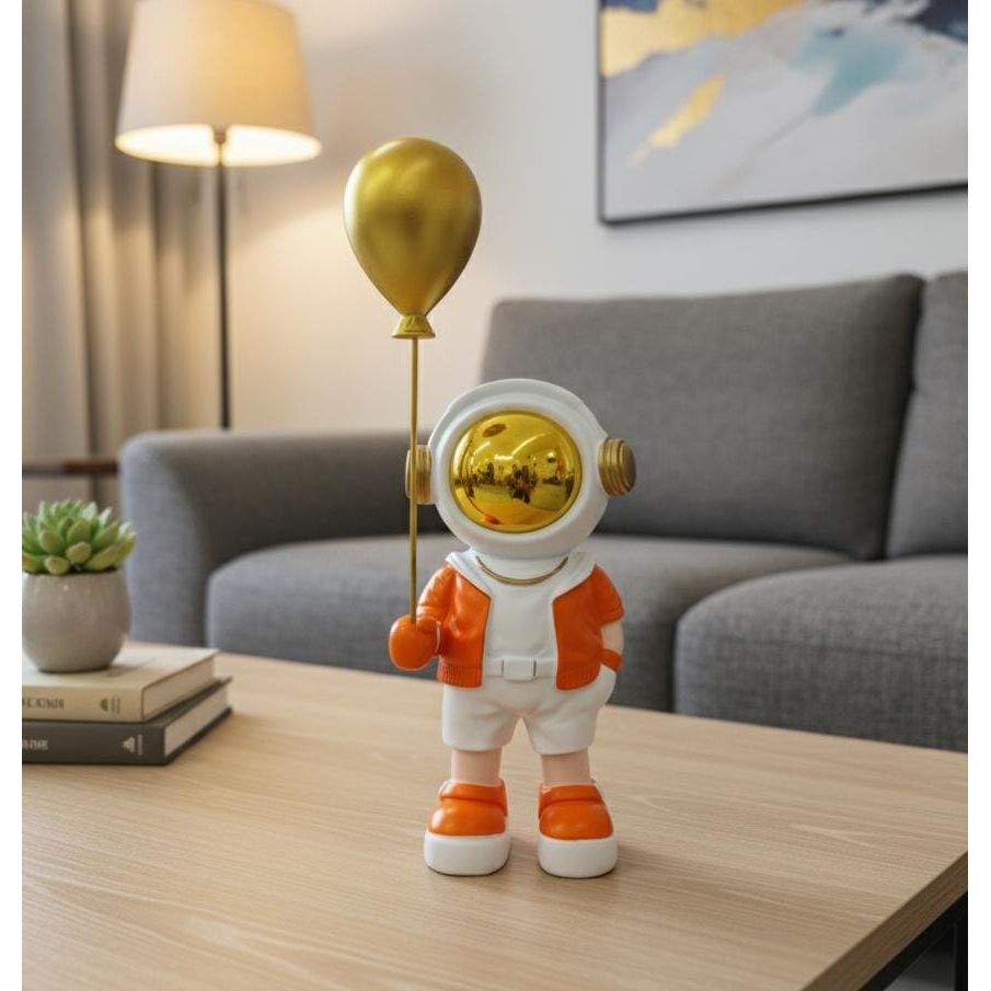 AKDC 20cm Ceramic Astronaut Holding Balloon Décor in White with Orange | Charming Space Sculpture for Home or Office - Al Kabayel Discount CentreAKDC 20cm Ceramic Astronaut Holding Balloon Décor in White with Orange | Charming Space Sculpture for Home or OfficeHome Décor AccentsAKDCAl Kabayel Discount Centre
