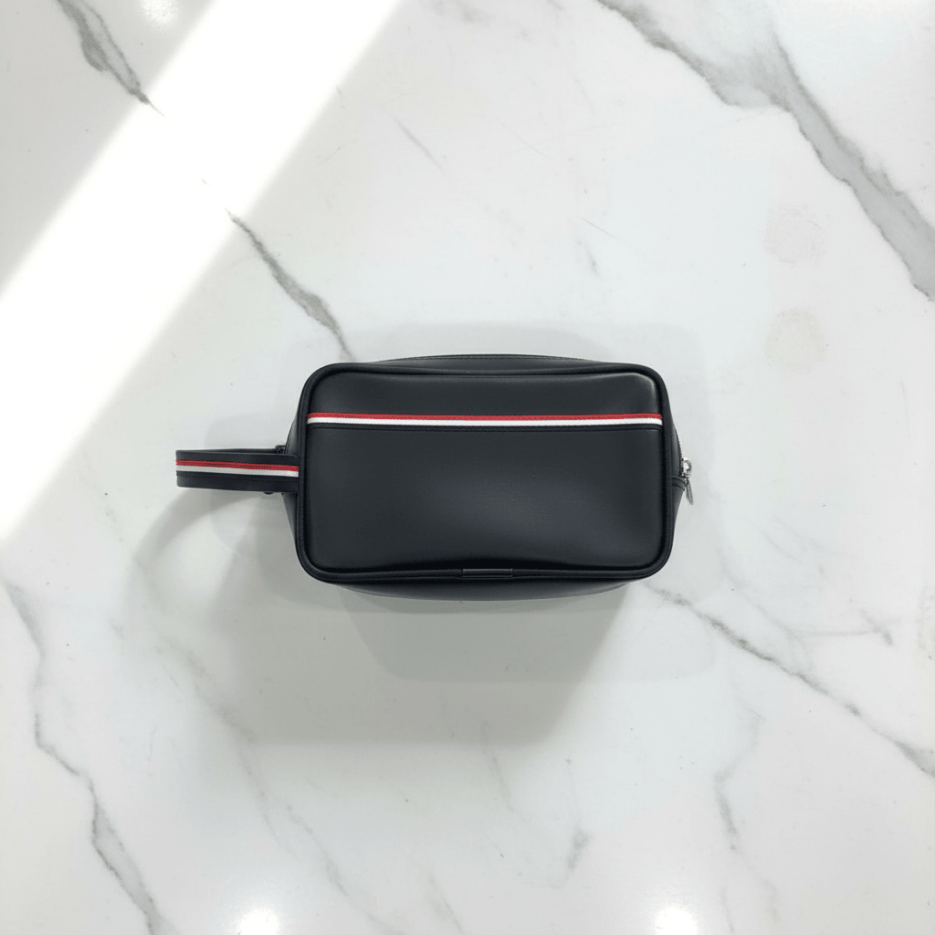 AKDC Black Artificial Leather Handbag Pouch 22×13 cm Practical Storage Solution with Clean Minimal Style - Al Kabayel Discount CentreAKDC Black Artificial Leather Handbag Pouch 22×13 cm Practical Storage Solution with Clean Minimal StylePouchesAKDCAl Kabayel Discount Centre