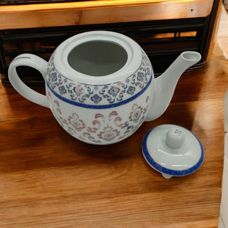 AKDC Ceramic Teapot Vintage Tea Kettle Tea Pot Porcelain Teapot for Home Kitchen Supplies - 1Liter - Al Kabayel Discount CentreAKDC Ceramic Teapot Vintage Tea Kettle Tea Pot Porcelain Teapot for Home Kitchen Supplies - 1LiterTea/Coffee PotsAKDCAl Kabayel Discount Centre