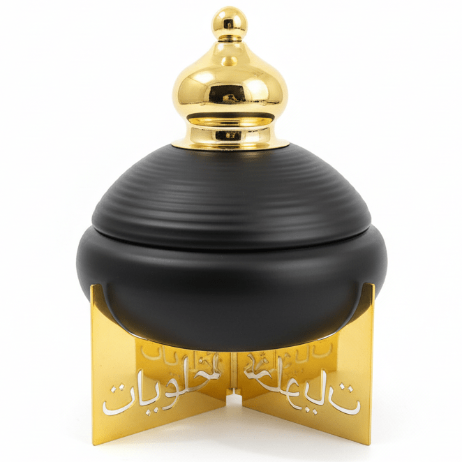 AKDC Decorative Metal Candy Jar with Lid and Raised Stand – Elegant Black and Gold Finish Storage Jar for Sweets, Dry Fruits and Home Display, Size 22 × 18 cm - Al Kabayel Discount CentreAKDC Decorative Metal Candy Jar with Lid and Raised Stand – Elegant Black and Gold Finish Storage Jar for Sweets, Dry Fruits and Home Display, Size 22 × 18 cmJars & Food SaversAKDCAl Kabayel Discount Centre