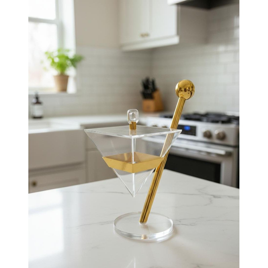 AKDC Designer Glass Candy Pot with Gold Metal Holder – Unique Decorative Serving Bowl for Sweets, Snacks, or Home Decor 28x14 cm - Al Kabayel Discount CentreAKDC Designer Glass Candy Pot with Gold Metal Holder – Unique Decorative Serving Bowl for Sweets, Snacks, or Home Decor 28x14 cmJars & Food SaversAKDCAl Kabayel Discount Centre