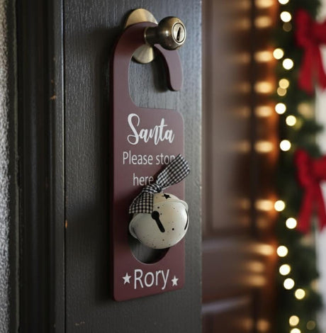 AKDC Red “Santa Please Stop Here for Rory” Hanging Décor with Bell – Festive Christmas Wall Sign & Door Ornament - Al Kabayel Discount CentreAKDC Red “Santa Please Stop Here for Rory” Hanging Décor with Bell – Festive Christmas Wall Sign & Door OrnamentHome Décor AccentsAKDCAl Kabayel Discount Centre
