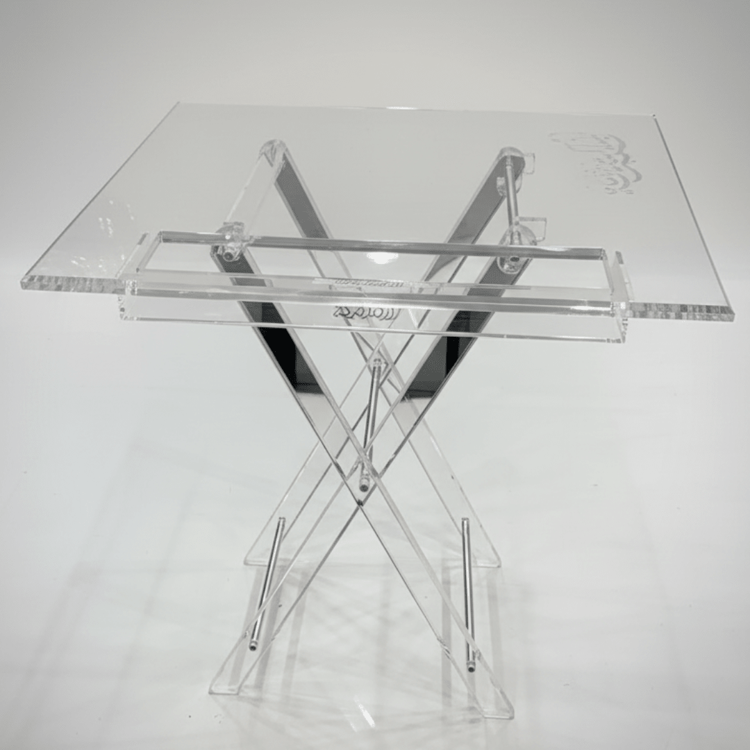 AKDC Square Clear Acrylic Foldable Table Set with Silver Metal Supports and Subtle Arabic Calligraphy Pattern Contemporary Design 50x40x47 cm - Al Kabayel Discount CentreAKDC Square Clear Acrylic Foldable Table Set with Silver Metal Supports and Subtle Arabic Calligraphy Pattern Contemporary Design 50x40x47 cmOrganizers & AccessoriesAKDCAl Kabayel Discount Centre