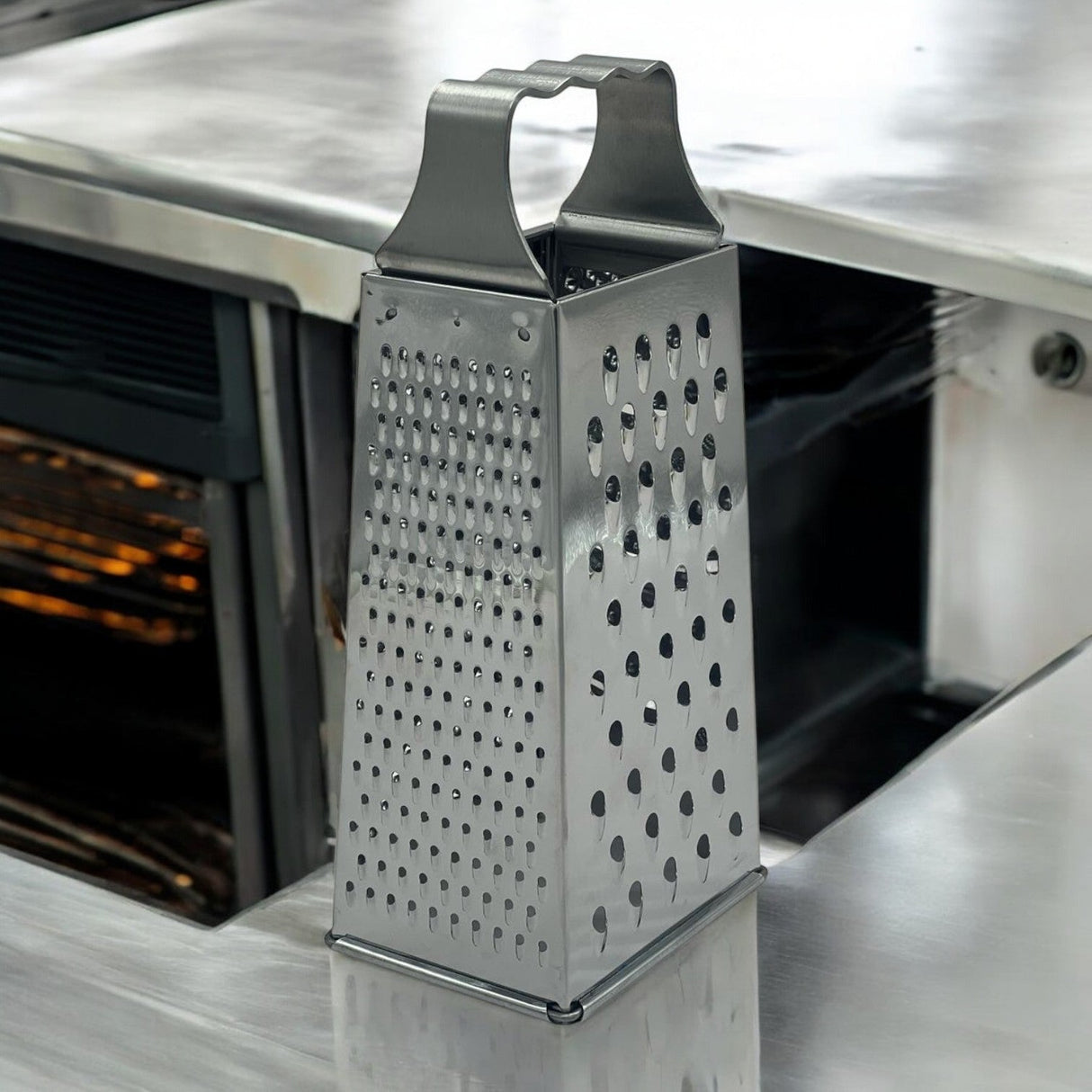 AKDC Stainless Steel 4 Side Grater Zest Sharp Blade & Easy Grip Handle Best For Parmesan Cheese, Vegetables, Ginger - 11cmX8.5cmX24.5cm - Al Kabayel Discount CentreAKDC Stainless Steel 4 Side Grater Zest Sharp Blade & Easy Grip Handle Best For Parmesan Cheese, Vegetables, Ginger - 11cmX8.5cmX24.5cmKitchen Utensils & GadgetsAKDCAl Kabayel Discount Centre