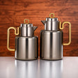 Almarjan 2pcs Vacuum flask Set 0.5 liter + 1 liter Matt nickel & matt gold (FG815 - 050/100 MNI/MG) - Al Kabayel Discount CentreAlmarjan 2pcs Vacuum flask Set 0.5 liter + 1 liter Matt nickel & matt gold (FG815 - 050/100 MNI/MG)ThermosALMARJANAl Kabayel Discount Centre