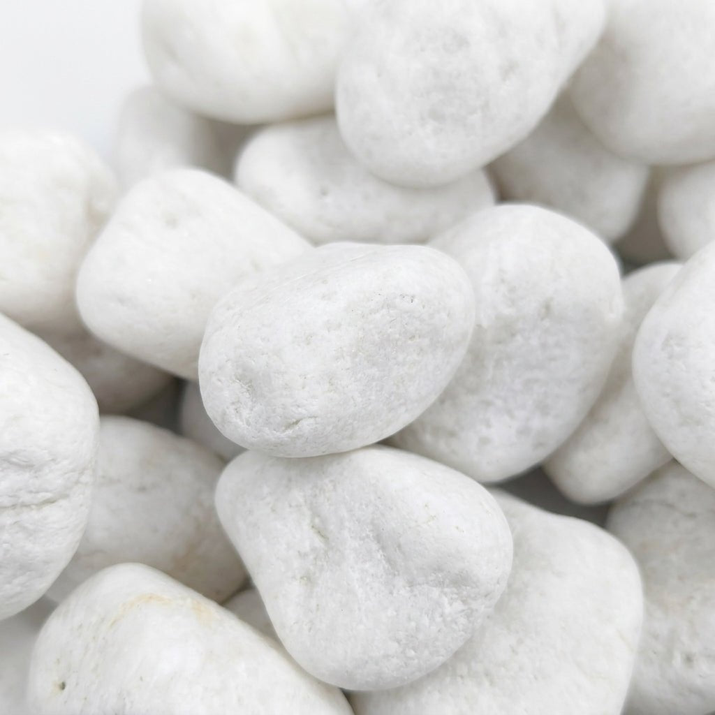 Decorative White Pebble Stones – Net Bag 80g - Al Kabayel Discount CentreDecorative White Pebble Stones – Net Bag 80gStonesAKDCAl Kabayel Discount Centre