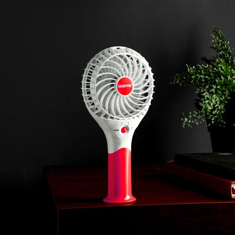 Geepas GF9617 Rechargeable Mini Fan – 3 Speed Portable Handheld Fan with 3.7V (Orange/Blue/Green/Pink) - Al Kabayel Discount CentreGeepas GF9617 Rechargeable Mini Fan – 3 Speed Portable Handheld Fan with 3.7V (Orange/Blue/Green/Pink)Mini FansGEEPASAl Kabayel Discount Centre