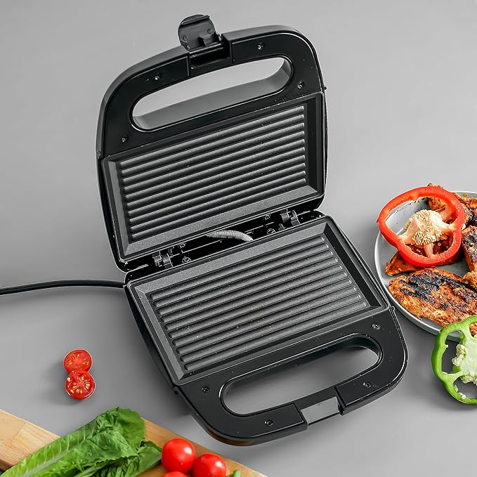 Geepas Portable Powerful 700W 2 Slice Grill Maker with Non - Stick Plates GGM6001| | Easy to Clean | Practical Cable Winding | Lid Locking for Space - Saving Vertical Storage - Al Kabayel Dicount CenterGeepas Portable Powerful 700W 2 Slice Grill Maker with Non - Stick Plates GGM6001| | Easy to Clean | Practical Cable Winding | Lid Locking for Space - Saving Vertical StorageIndoor Grills & GriddlesgeepassAl Kabayel Dicount Center