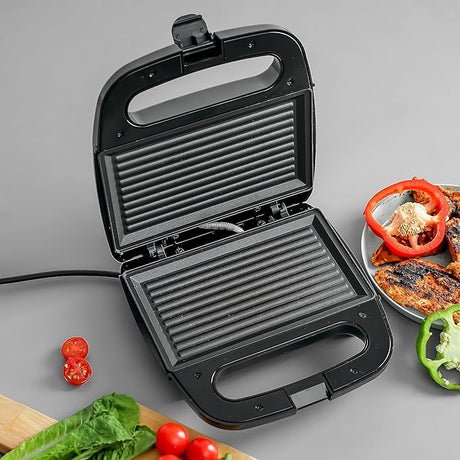Geepas Portable Powerful 700W 2 Slice Grill Maker with Non - Stick Plates GGM6001| | Easy to Clean | Practical Cable Winding | Lid Locking for Space - Saving Vertical Storage - Al Kabayel Dicount CenterGeepas Portable Powerful 700W 2 Slice Grill Maker with Non - Stick Plates GGM6001| | Easy to Clean | Practical Cable Winding | Lid Locking for Space - Saving Vertical StorageIndoor Grills & GriddlesgeepassAl Kabayel Dicount Center