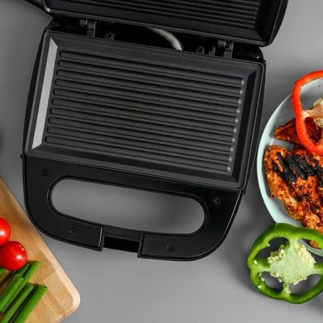 Geepas Portable Powerful 700W 2 Slice Grill Maker with Non - Stick Plates GGM6001| | Easy to Clean | Practical Cable Winding | Lid Locking for Space - Saving Vertical Storage - Al Kabayel Dicount CenterGeepas Portable Powerful 700W 2 Slice Grill Maker with Non - Stick Plates GGM6001| | Easy to Clean | Practical Cable Winding | Lid Locking for Space - Saving Vertical StorageIndoor Grills & GriddlesgeepassAl Kabayel Dicount Center