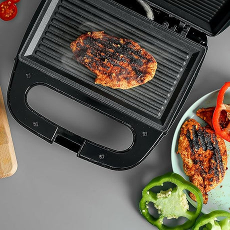 Geepas Portable Powerful 700W 2 Slice Grill Maker with Non - Stick Plates GGM6001| | Easy to Clean | Practical Cable Winding | Lid Locking for Space - Saving Vertical Storage - Al Kabayel Dicount CenterGeepas Portable Powerful 700W 2 Slice Grill Maker with Non - Stick Plates GGM6001| | Easy to Clean | Practical Cable Winding | Lid Locking for Space - Saving Vertical StorageIndoor Grills & GriddlesgeepassAl Kabayel Dicount Center