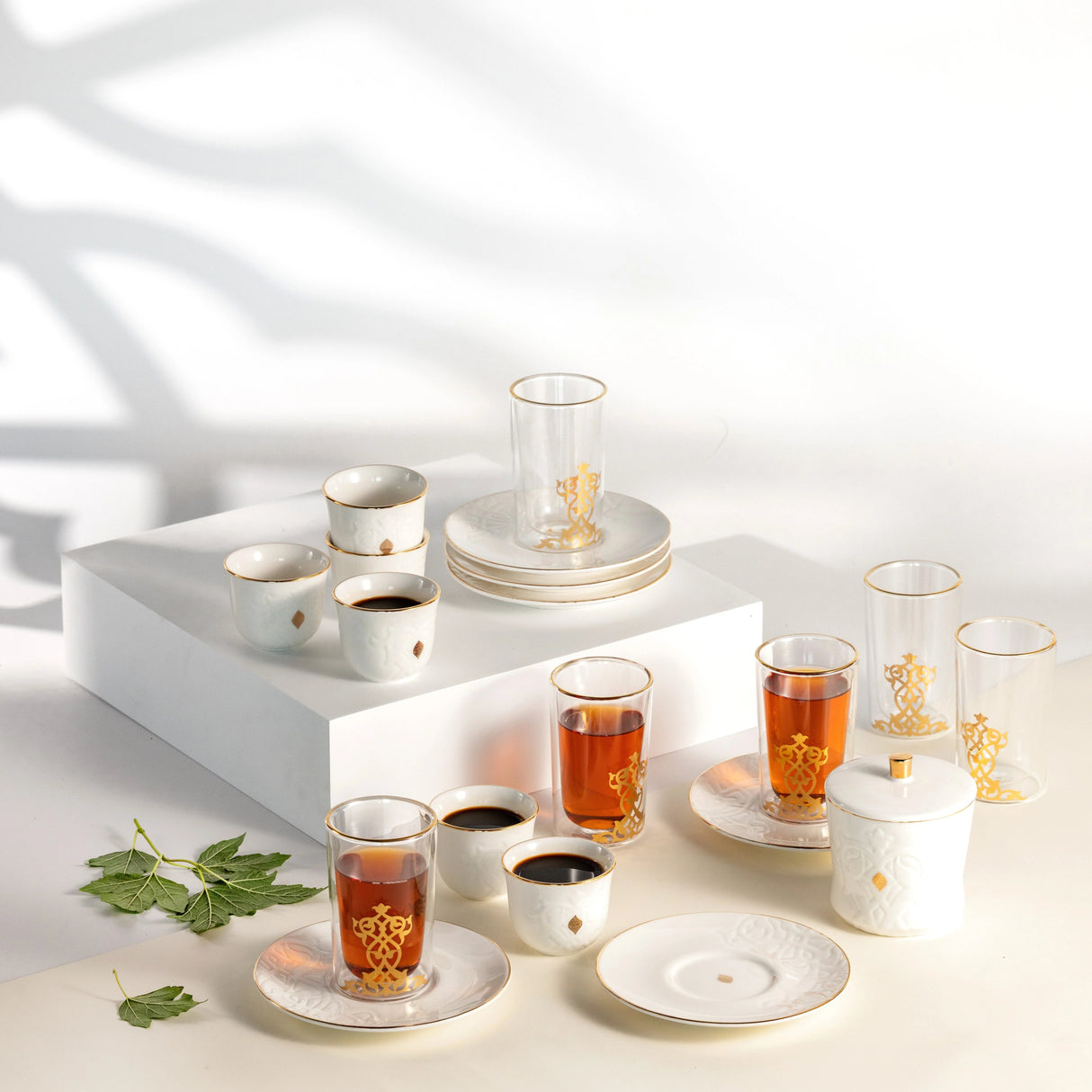Otantic Naqsh 19pcs Tea & Arabic Coffee Set, 6pcs Double Glass Cups 130ml + 6pc Saucers + 6pcs Arabic Coffee Cup 80ml +1pc Sugar Pot 250ml, White/Gold, ET2940 - Al Kabayel Discount CentreOtantic Naqsh 19pcs Tea & Arabic Coffee Set, 6pcs Double Glass Cups 130ml + 6pc Saucers + 6pcs Arabic Coffee Cup 80ml +1pc Sugar Pot 250ml, White/Gold, ET2940Tea SetsOTANTIKAl Kabayel Discount Centre
