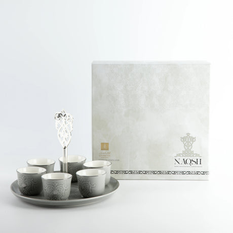 Otantic Naqsh 7pcs Porcelain Arabic Coffee Set, 6pcs Cups 80ml +1pc Standwith Handle, Grey/Silver, ET2968 - Al Kabayel Discount CentreOtantic Naqsh 7pcs Porcelain Arabic Coffee Set, 6pcs Cups 80ml +1pc Standwith Handle, Grey/Silver, ET2968Tea SetsOTANTIKAl Kabayel Discount Centre