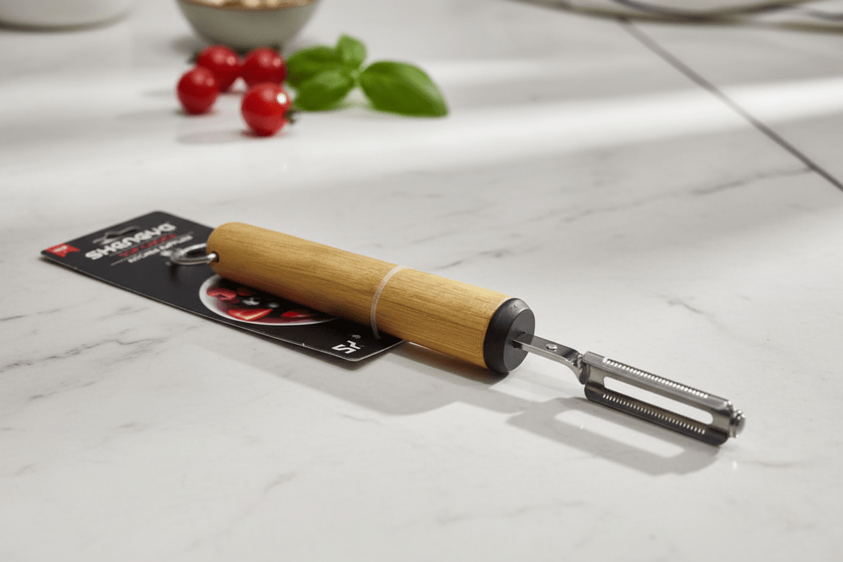 Shengya Classic Stainless Steel Vegetable Peeler with Wooden Handle – Smooth Grip Kitchen Essential (22 cm) - Al Kabayel Discount CentreShengya Classic Stainless Steel Vegetable Peeler with Wooden Handle – Smooth Grip Kitchen Essential (22 cm)PeelersSHENGYAAl Kabayel Discount Centre