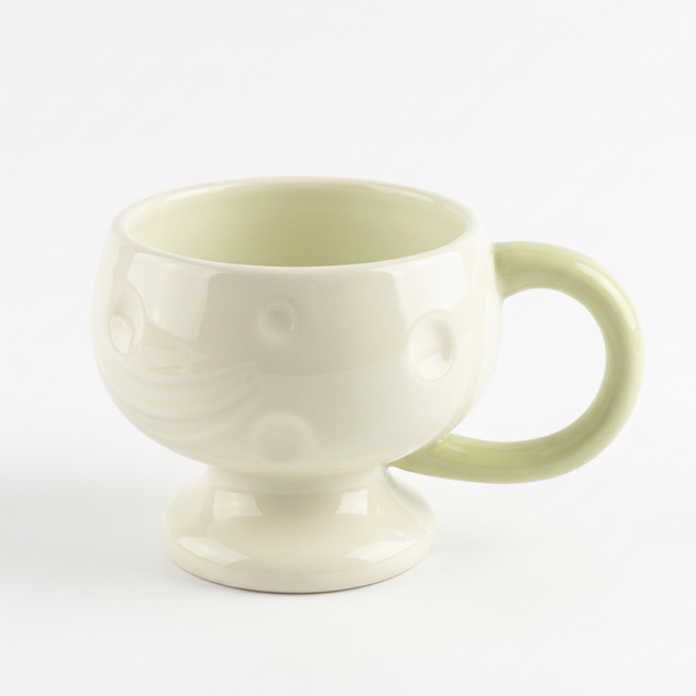 Ceramic Pedestal Mug 300 ml – Cream with Light Green Handle

