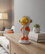 AKDC 16cm Ceramic Small Astronaut Standing Décor in White with Orange | Artistic Decorative Mini Astronaut Sculpture - Al Kabayel Discount CentreAKDC 16cm Ceramic Small Astronaut Standing Décor in White with Orange | Artistic Decorative Mini Astronaut SculptureHome Décor AccentsAKDCAl Kabayel Discount Centre