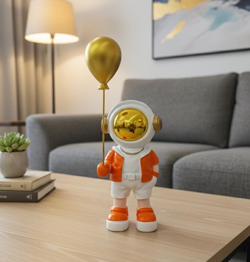 AKDC 20cm Ceramic Astronaut Holding Balloon Décor in White with Orange | Charming Space Sculpture for Home or Office - Al Kabayel Discount CentreAKDC 20cm Ceramic Astronaut Holding Balloon Décor in White with Orange | Charming Space Sculpture for Home or OfficeHome Décor AccentsAKDCAl Kabayel Discount Centre