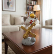 AKDC 22cm Ceramic Astronaut Balancing on Satellite Décor in White with Gold | Futuristic Artistic Home Accent - Al Kabayel Discount CentreAKDC 22cm Ceramic Astronaut Balancing on Satellite Décor in White with Gold | Futuristic Artistic Home AccentHome Décor AccentsAKDCAl Kabayel Discount Centre