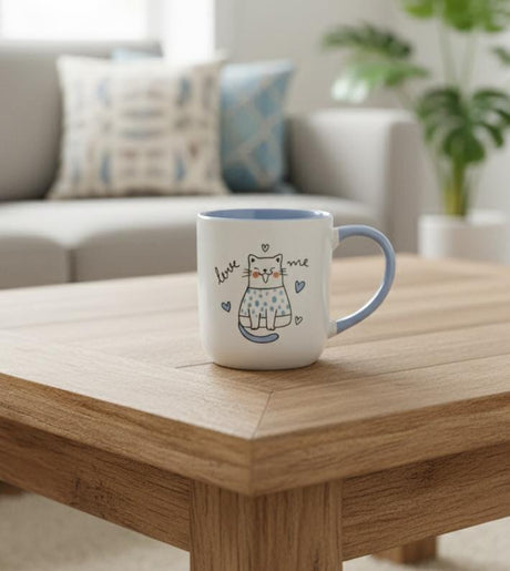 AKDC 400ml White Ceramic Mug with Blue & Kitten Design – Playful Edition with Adorable Touch - Al Kabayel Discount CentreAKDC 400ml White Ceramic Mug with Blue & Kitten Design – Playful Edition with Adorable TouchMugsAKDCAl Kabayel Discount Centre