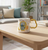 AKDC 400ml White Ceramic Mug with Bright Yellow Flower Design – Fresh, Cheerful, and Perfect for Morning Coffee Moments - Al Kabayel Discount CentreAKDC 400ml White Ceramic Mug with Bright Yellow Flower Design – Fresh, Cheerful, and Perfect for Morning Coffee MomentsMugsAKDCAl Kabayel Discount Centre