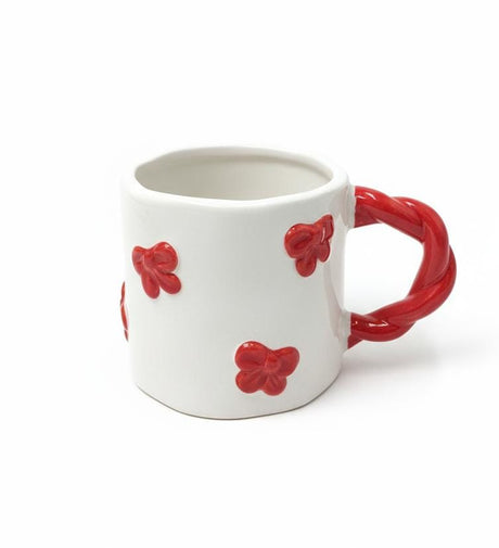 AKDC 400ml White Ceramic Mug with Red Bow Design – Classic, Minimal, and Beautiful for Everyday Enjoyment - Al Kabayel Discount CentreAKDC 400ml White Ceramic Mug with Red Bow Design – Classic, Minimal, and Beautiful for Everyday EnjoymentMugsAKDCAl Kabayel Discount Centre