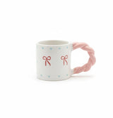 AKDC 400ml White Ceramic Mug with Soft Pink Bow Design – Stylish, Elegant & Ideal for Gifting or Daily Use - Al Kabayel Discount CentreAKDC 400ml White Ceramic Mug with Soft Pink Bow Design – Stylish, Elegant & Ideal for Gifting or Daily UseMugsAKDCAl Kabayel Discount Centre