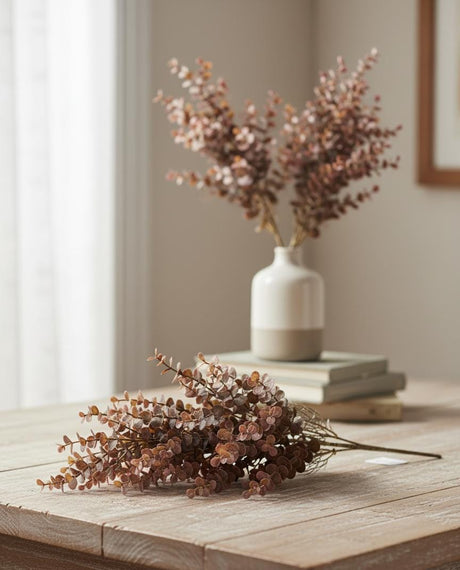 AKDC Artificial Dried Eucalyptus Branch - Plastic Material Mimicking Dried Foliage, Adds Rustic Charm to Any Space, 54 cm," - Designed with plastic to emulate the silvery, dried texture of eucalyptus leaves for a bohemian feel. - Al Kabayel Discount CentreAKDC Artificial Dried Eucalyptus Branch - Plastic Material Mimicking Dried Foliage, Adds Rustic Charm to Any Space, 54 cm," - Designed with plastic to emulate the silvery, dried texture of eucalyptus leaves for a bohemian feel.Artificial FloraA