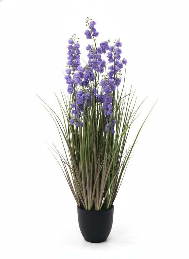 AKDC Artificial Grass with Lavender Flowers - Potted in Plastic Pot, Fragrant - Looking Blooms for Endless Beauty, 80 cm," - Combines plastic grass with lavender - hued flowers, evoking a fragrant field without the pollen. - Al Kabayel Discount CentreAKDC Artificial Grass with Lavender Flowers - Potted in Plastic Pot, Fragrant - Looking Blooms for Endless Beauty, 80 cm," - Combines plastic grass with lavender - hued flowers, evoking a fragrant field without the pollen.Artificial FloraAKDCAl Kaba