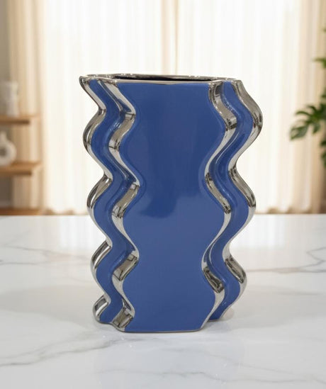 AKDC Blue & Silver Decorative Flower Vase 19cm – Elegant Ceramic - Style Plastic Vase for Artificial or Fresh Flowers, Ideal for Home & Office Decor - Al Kabayel Discount CentreAKDC Blue & Silver Decorative Flower Vase 19cm – Elegant Ceramic - Style Plastic Vase for Artificial or Fresh Flowers, Ideal for Home & Office DecorFlower/Plant PotsAKDCAl Kabayel Discount Centre
