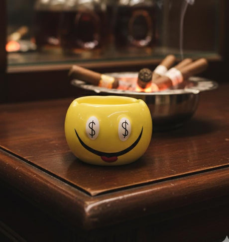 AKDC Ceramic Round Smiley Face Ashtray – Yellow Color with Dollar Eyes Design, Cool Decorative Smoking Tray - Al Kabayel Discount CentreAKDC Ceramic Round Smiley Face Ashtray – Yellow Color with Dollar Eyes Design, Cool Decorative Smoking TrayHome Décor AccentsAKDCAl Kabayel Discount Centre