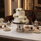 AKDC Classic Footed Stainless Steel Cake Stand – Premium Elevated Cake & Pastry Display – 26 × 16 cm - Al Kabayel Discount CentreAKDC Classic Footed Stainless Steel Cake Stand – Premium Elevated Cake & Pastry Display – 26 × 16 cmServing TraysAKDCAl Kabayel Discount Centre