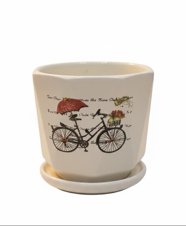 AKDC Compact White Ceramic Pot with Cycle Pattern Artwork – 9×10 cm - Al Kabayel Discount CentreAKDC Compact White Ceramic Pot with Cycle Pattern Artwork – 9×10 cmFlower/Plant PotsAKDCAl Kabayel Discount Centre