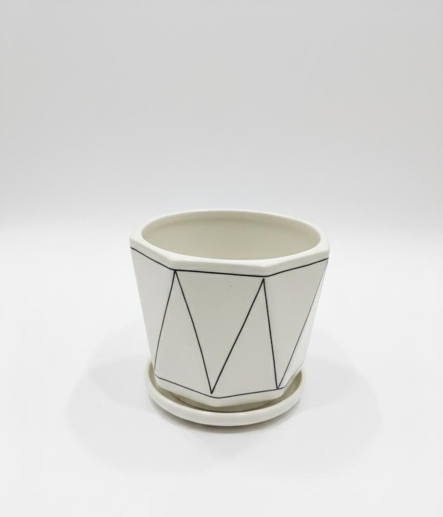 AKDC Designer White Ceramic Pot with Black Geometric Triangle Line Pattern – 15×17 cm - Al Kabayel Discount CentreAKDC Designer White Ceramic Pot with Black Geometric Triangle Line Pattern – 15×17 cmFlower/Plant PotsAKDCAl Kabayel Discount Centre