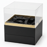 AKDC Elegant Black Square Cardboard Gift Box with Clear Lid & Ties for Luxury Gift Presentation, Hampers & Storage – 18×18×19 cm - Al Kabayel Discount CentreAKDC Elegant Black Square Cardboard Gift Box with Clear Lid & Ties for Luxury Gift Presentation, Hampers & Storage – 18×18×19 cmPacking & Wrapping SuppliesAKDCAl Kabayel Discount Centre