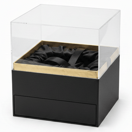 AKDC Elegant Black Square Cardboard Gift Box with Clear Lid & Ties for Luxury Gift Presentation, Hampers & Storage – 18×18×19 cm - Al Kabayel Discount CentreAKDC Elegant Black Square Cardboard Gift Box with Clear Lid & Ties for Luxury Gift Presentation, Hampers & Storage – 18×18×19 cmPacking & Wrapping SuppliesAKDCAl Kabayel Discount Centre