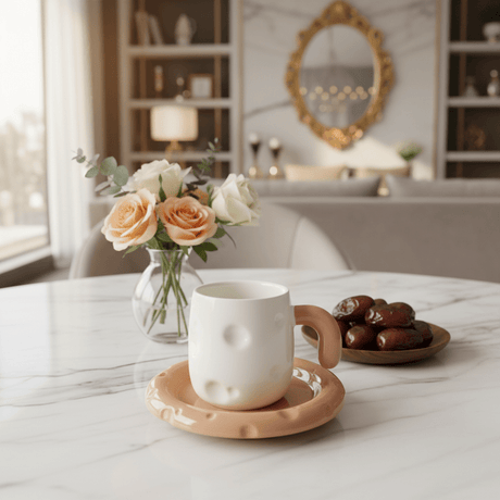 AKDC Elegant White Ceramic Mug with Peach Color Handle & Matching Saucer Set 250ml - Al Kabayel Discount CentreAKDC Elegant White Ceramic Mug with Peach Color Handle & Matching Saucer Set 250mlTea CupsAKDCAl Kabayel Discount Centre