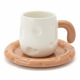 AKDC Elegant White Ceramic Mug with Peach Color Handle & Matching Saucer Set 250ml - Al Kabayel Discount CentreAKDC Elegant White Ceramic Mug with Peach Color Handle & Matching Saucer Set 250mlTea CupsAKDCAl Kabayel Discount Centre