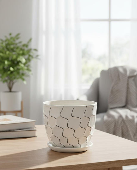 AKDC Elegant White Ceramic Pot with Artistic Black Wave Line Design – 15×17 cm - Al Kabayel Discount CentreAKDC Elegant White Ceramic Pot with Artistic Black Wave Line Design – 15×17 cmFlower/Plant PotsAKDCAl Kabayel Discount Centre