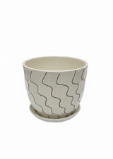 AKDC Elegant White Ceramic Pot with Artistic Black Wave Line Design – 15×17 cm - Al Kabayel Discount CentreAKDC Elegant White Ceramic Pot with Artistic Black Wave Line Design – 15×17 cmFlower/Plant PotsAKDCAl Kabayel Discount Centre