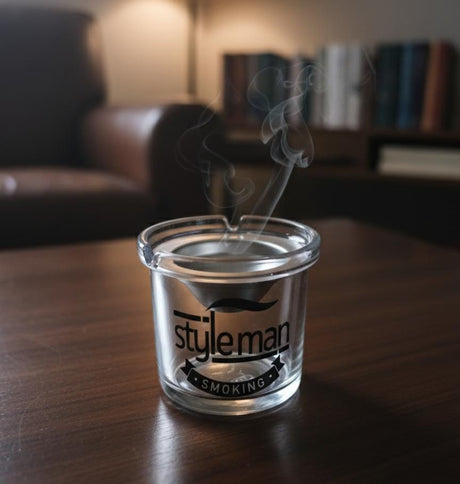 AKDC Glass Ashtray with Steel Top – Modern Round Design Featuring Stylish Man Smoking Logo, Elegant Tabletop Piece - Al Kabayel Discount CentreAKDC Glass Ashtray with Steel Top – Modern Round Design Featuring Stylish Man Smoking Logo, Elegant Tabletop PieceHome Décor AccentsAKDCAl Kabayel Discount Centre