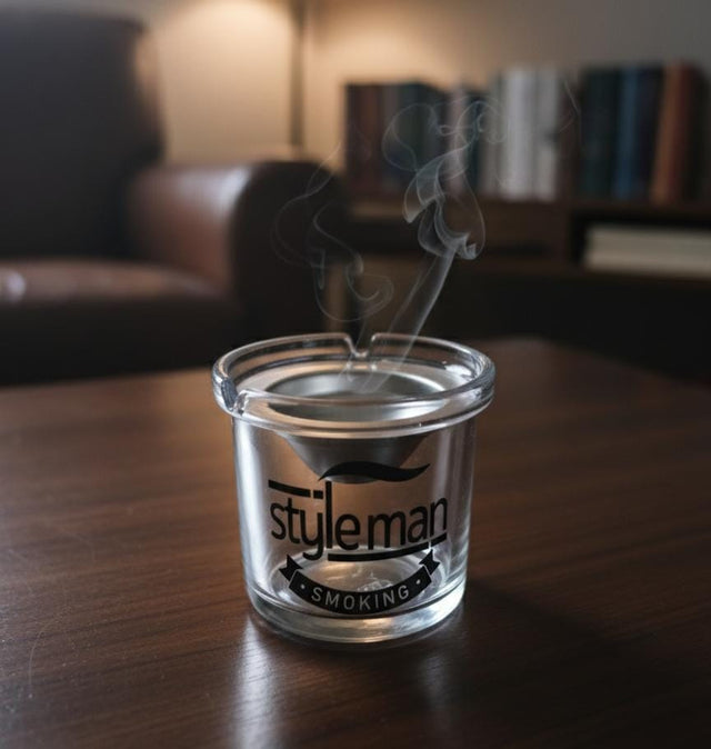 AKDC Glass Ashtray with Steel Top – Modern Round Design Featuring Stylish Man Smoking Logo, Elegant Tabletop Piece - Al Kabayel Discount CentreAKDC Glass Ashtray with Steel Top – Modern Round Design Featuring Stylish Man Smoking Logo, Elegant Tabletop PieceHome Décor AccentsAKDCAl Kabayel Discount Centre
