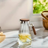 AKDC Glass Jug with Wooden Lid and Handle 1800ml, Square Bottom, Clear & Transparent - Al Kabayel Discount CentreAKDC Glass Jug with Wooden Lid and Handle 1800ml, Square Bottom, Clear & TransparentJugsAKDCAl Kabayel Discount Centre