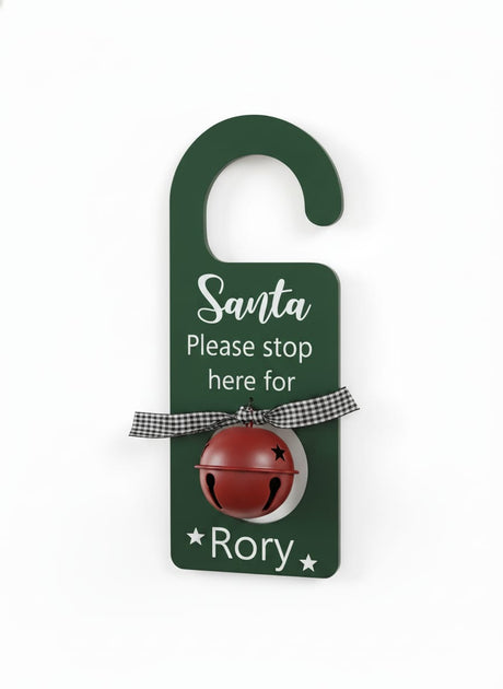 AKDC Green “Santa Please Stop Here for Rory” Christmas Hanging Décor with Bell – Holiday Door & Wall Decoration Sign - Al Kabayel Discount CentreAKDC Green “Santa Please Stop Here for Rory” Christmas Hanging Décor with Bell – Holiday Door & Wall Decoration SignHome Décor AccentsAKDCAl Kabayel Discount Centre