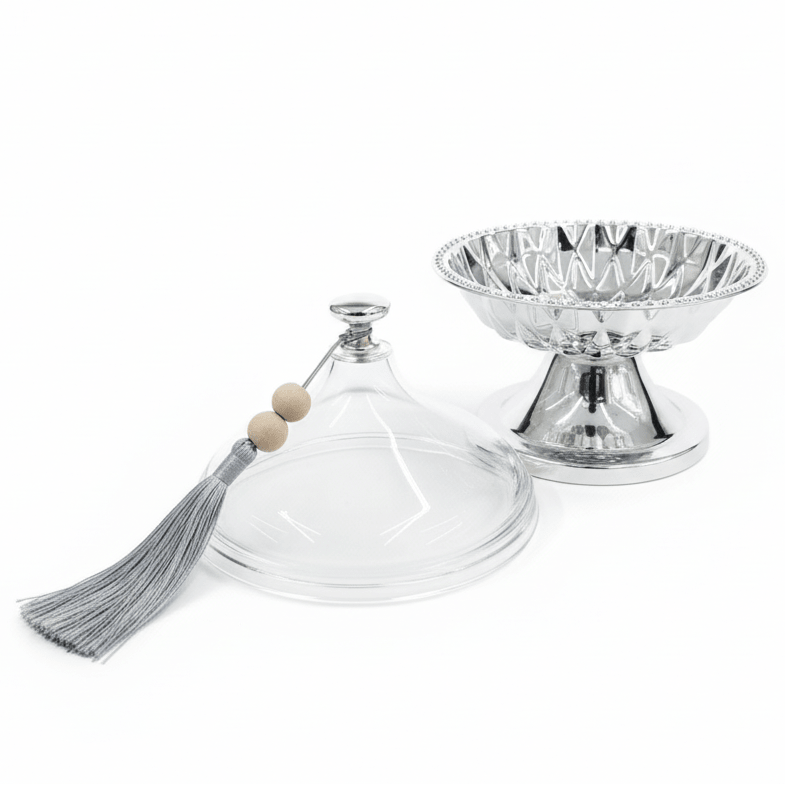 AKDC Luxury Metal Candy Bowl with Acrylic Lid – Premium Silver Finish, Decorative Storage for Sweets & Dry Fruits, 19 × 15 cm - Al Kabayel Discount CentreAKDC Luxury Metal Candy Bowl with Acrylic Lid – Premium Silver Finish, Decorative Storage for Sweets & Dry Fruits, 19 × 15 cmJars & Food SaversAKDCAl Kabayel Discount Centre