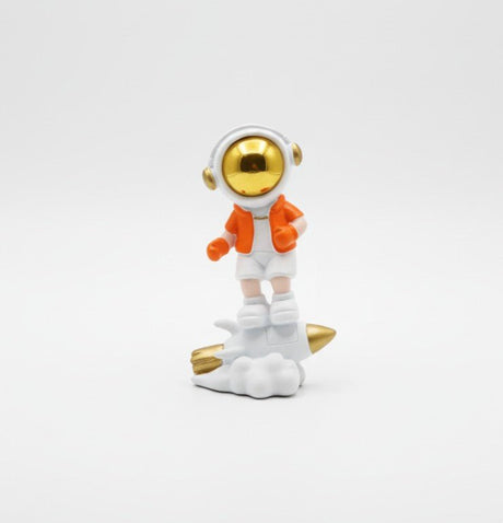 AKDC Mini Ceramic Astronaut Balancing on White & Orange Spaceship Figurine – Creative Space Décor 7.5 cm - Al Kabayel Discount CentreAKDC Mini Ceramic Astronaut Balancing on White & Orange Spaceship Figurine – Creative Space Décor 7.5 cmHome Décor AccentsAKDCAl Kabayel Discount Centre