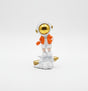 AKDC Mini Ceramic Astronaut Balancing on White & Orange Spaceship Figurine – Creative Space Décor 7.5 cm - Al Kabayel Discount CentreAKDC Mini Ceramic Astronaut Balancing on White & Orange Spaceship Figurine – Creative Space Décor 7.5 cmHome Décor AccentsAKDCAl Kabayel Discount Centre