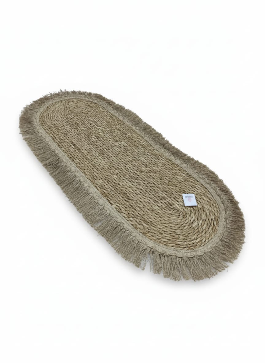 AKDC Oval Rattan Rug 35×100cm – Brownish Fringe Border, Traditional Design for Warm & Cozy Interiors - Al Kabayel Discount CentreAKDC Oval Rattan Rug 35×100cm – Brownish Fringe Border, Traditional Design for Warm & Cozy InteriorsDoormatsAKDCAl Kabayel Discount Centre