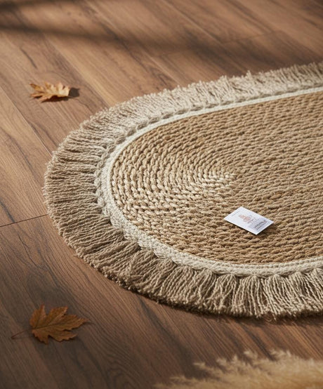 AKDC Oval Rattan Rug 35×100cm – Brownish Fringe Border, Traditional Design for Warm & Cozy Interiors - Al Kabayel Discount CentreAKDC Oval Rattan Rug 35×100cm – Brownish Fringe Border, Traditional Design for Warm & Cozy InteriorsDoormatsAKDCAl Kabayel Discount Centre