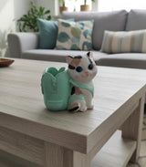 AKDC Polyresin Cat with Bag Pen Holder – White & Green Cute Animal Desk Organizer 12 cm - Al Kabayel Discount CentreAKDC Polyresin Cat with Bag Pen Holder – White & Green Cute Animal Desk Organizer 12 cmPen Holders & Desk OrganizersAKDCAl Kabayel Discount Centre
