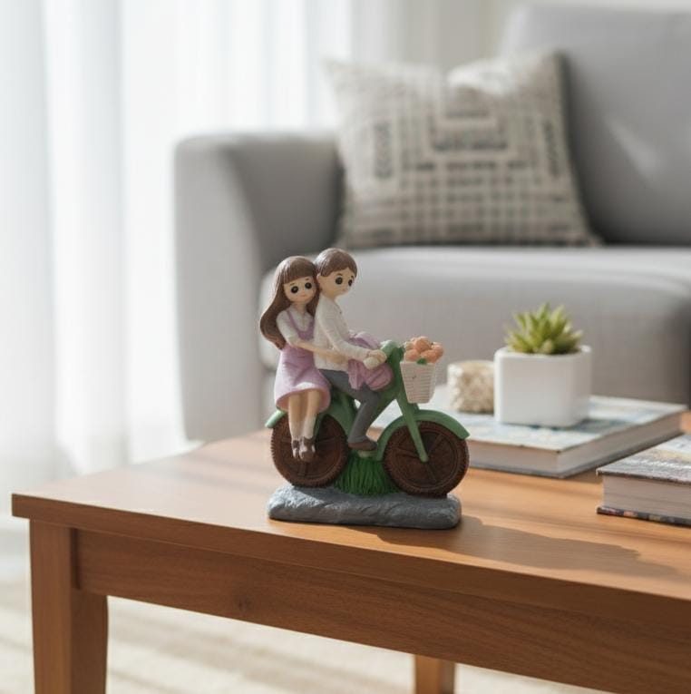 AKDC Polyresin Romantic Couple on Bicycle Figurine – Green & Pink Decorative Love Sculpture 12 cm - Al Kabayel Discount CentreAKDC Polyresin Romantic Couple on Bicycle Figurine – Green & Pink Decorative Love Sculpture 12 cmHome Décor AccentsAKDCAl Kabayel Discount Centre